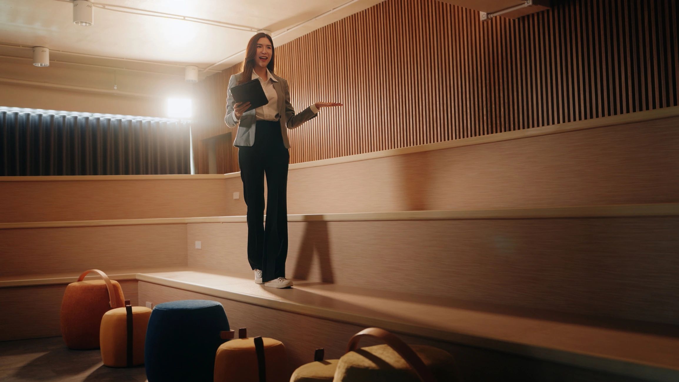 Mary Auguste-style keynote speaker presenting at a conference