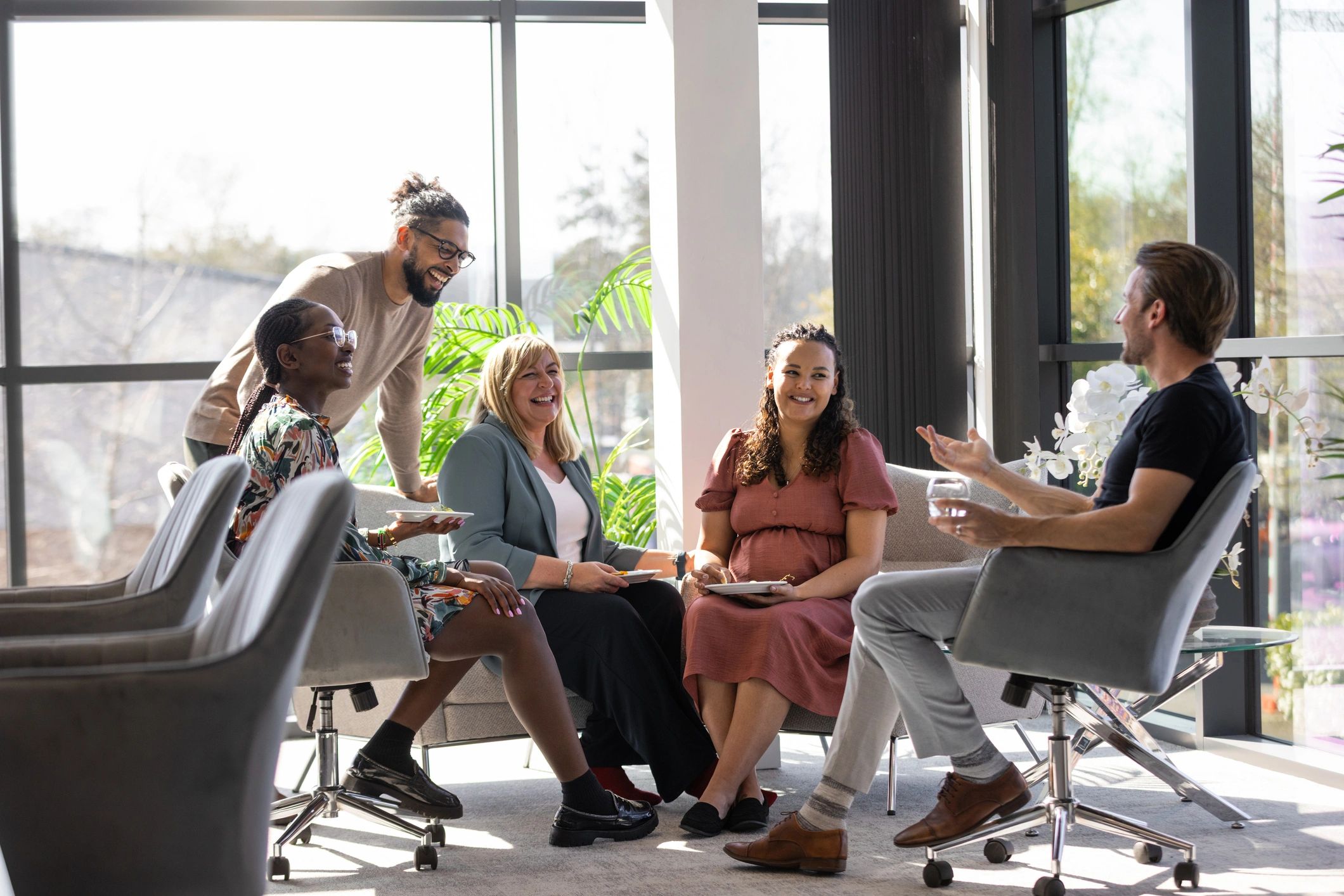 Professional team collaborating in a bright meeting room
