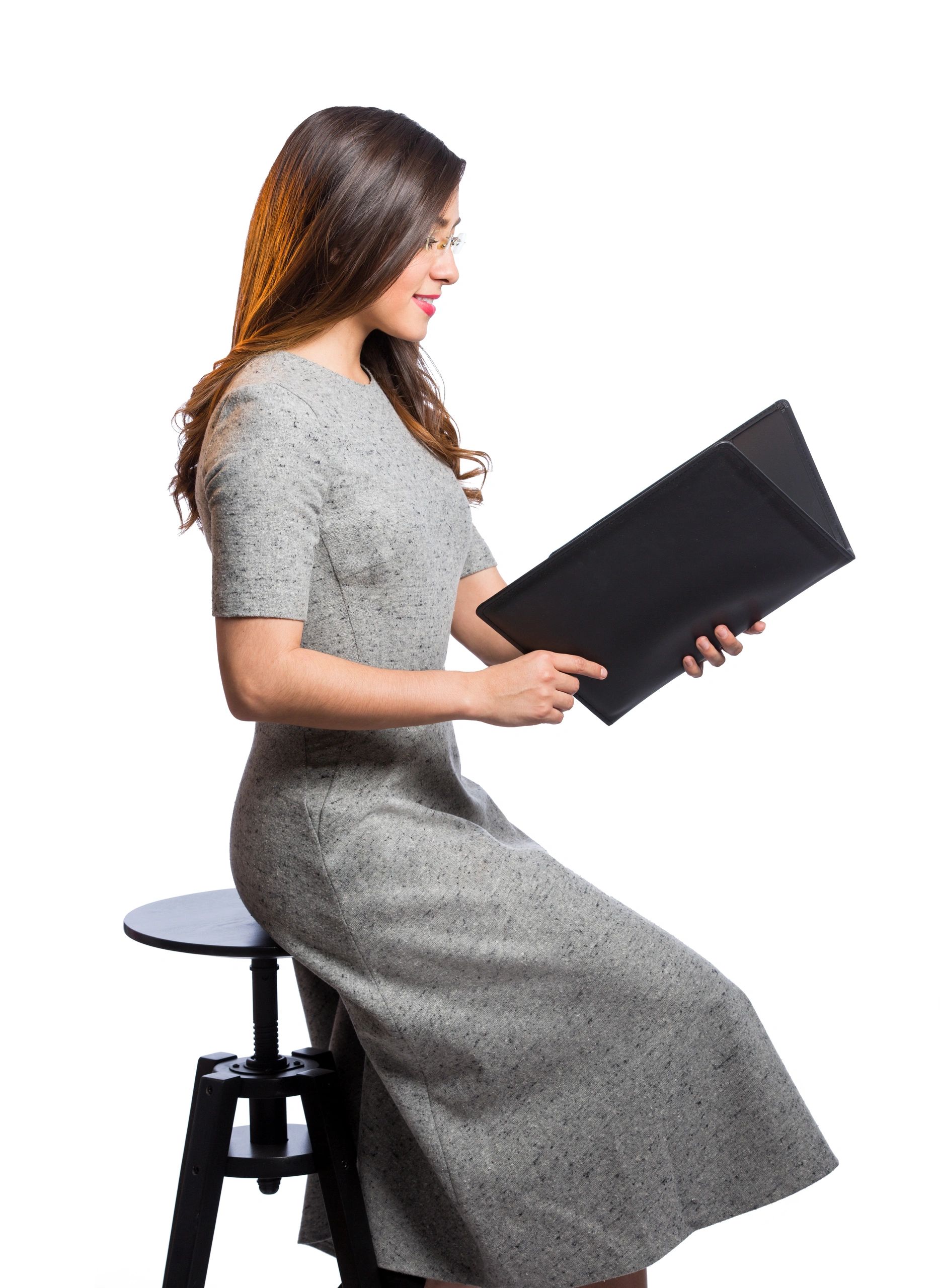Professional preparing thoughtful presentation materials